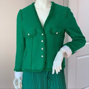Emerald green blazer in timeless Chanel style by Zara